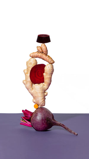 
                  
                    Load image into Gallery viewer, Ginger Turmeric Beet Shot Ingredients Turmeric Ginger Beets on White Elite Beet Root Rescue Wellness stack puck
                  
                